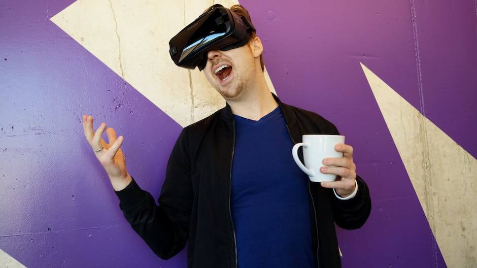 A person wearing a virtual reality headset and holding controllers, experiencing virtual reality technology in action